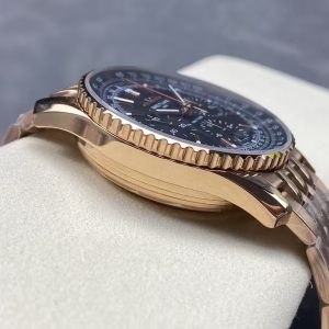 rose-gold toned chronograph on a full metal bracelet