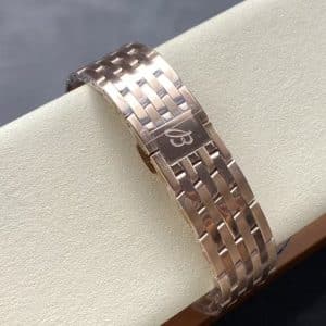 rose-gold toned chronograph on a full metal bracelet