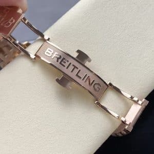 rose-gold toned chronograph on a full metal bracelet