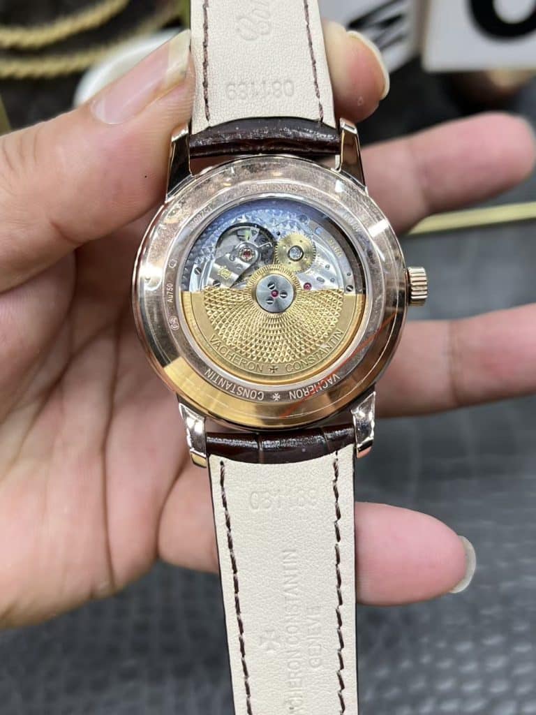9015 modified automatic movement with moon phase complication.