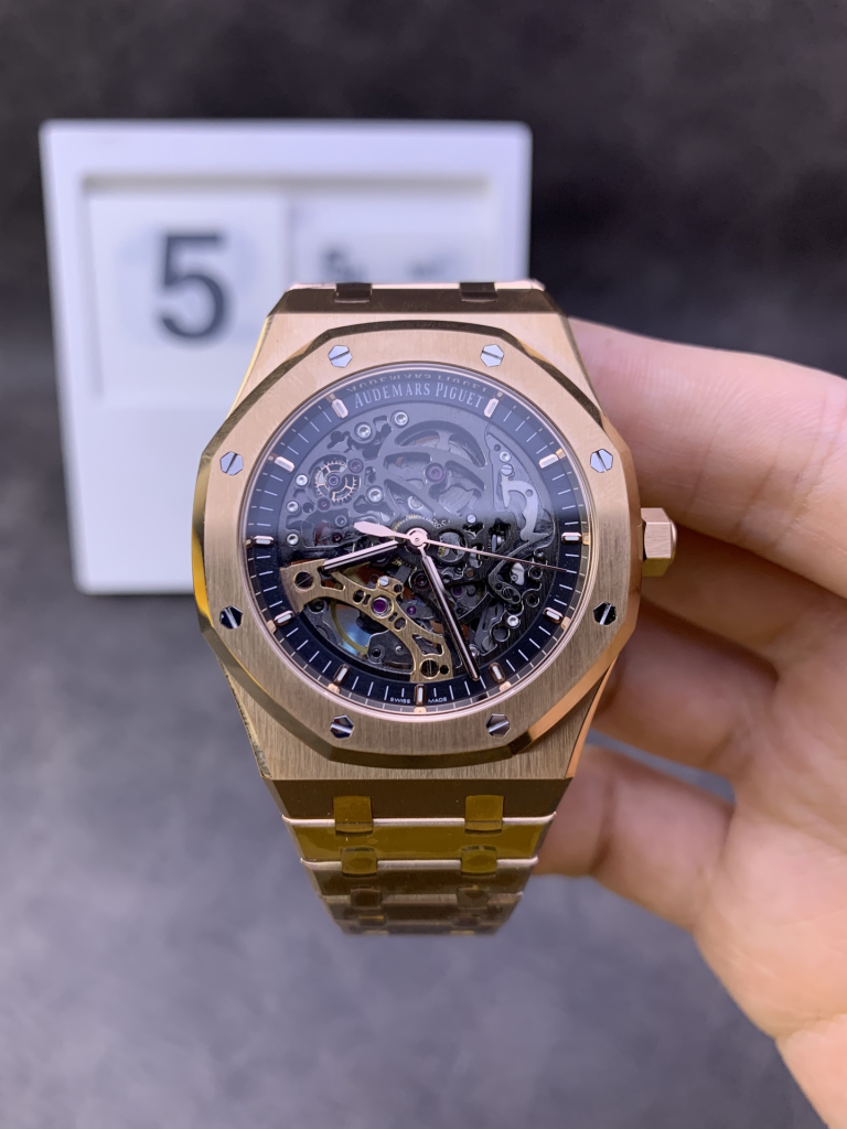 Audemars Piguet Royal Oak Offshore 15407ST.OO.1220ST.01 Men's Mechanical Watch: Calibre 3132 integrated movement, 41mm diameter, 9.9mm thickness. Dark grey dial: Round. Dial material: Skeletonized dial with rose gold luminescent applied hour markers and Royal Oak hands. Crystal material: Anti-reflective sapphire crystal. Crown material: Screw-down stainless steel. Case back: Transparent with anti-reflective sapphire crystal.