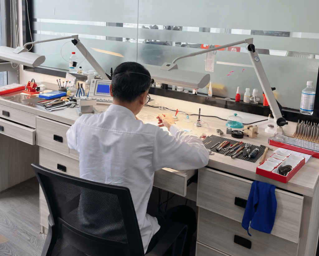 A watch repair technician from cleanvsfactory.