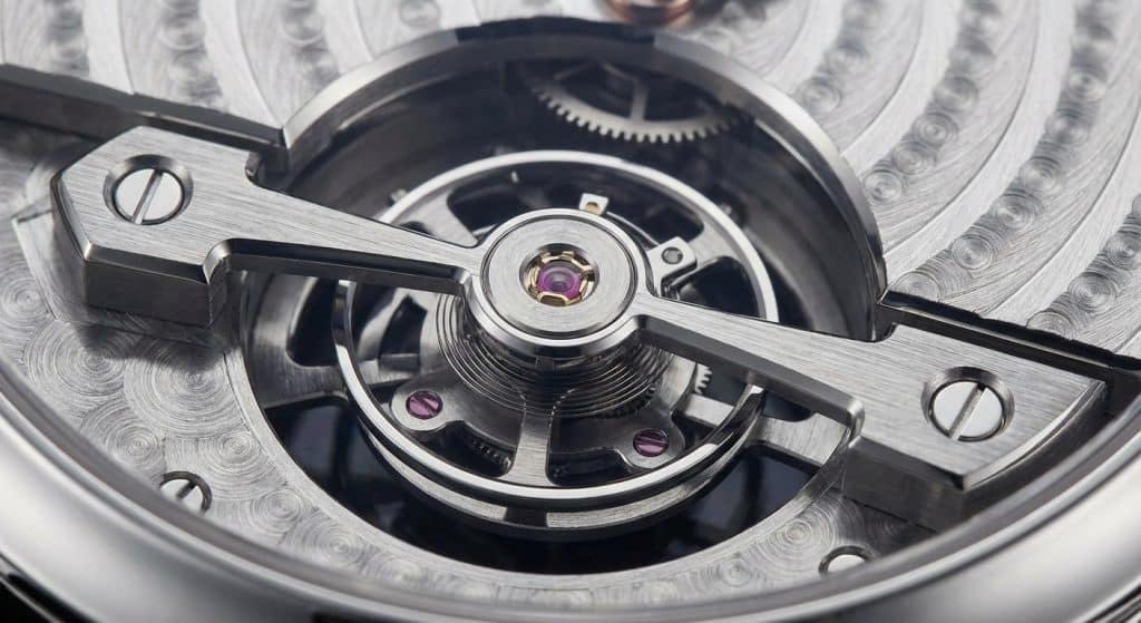 [IMAGE: Macro comparison of BBR Factory vs. Genuine Traditionnelle Tourbillon carriage and bridge finishing]