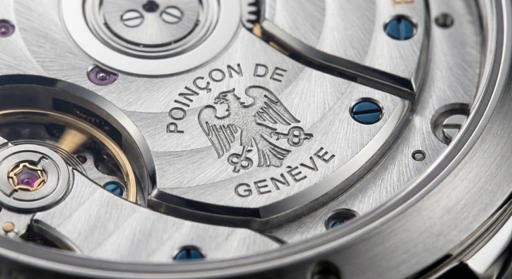 A high-resolution macro capture reveals the microscopic precision of the Poinçon de Genève engraving on the bridge of a 2026 ZF Calibre 5100 integrated movement.