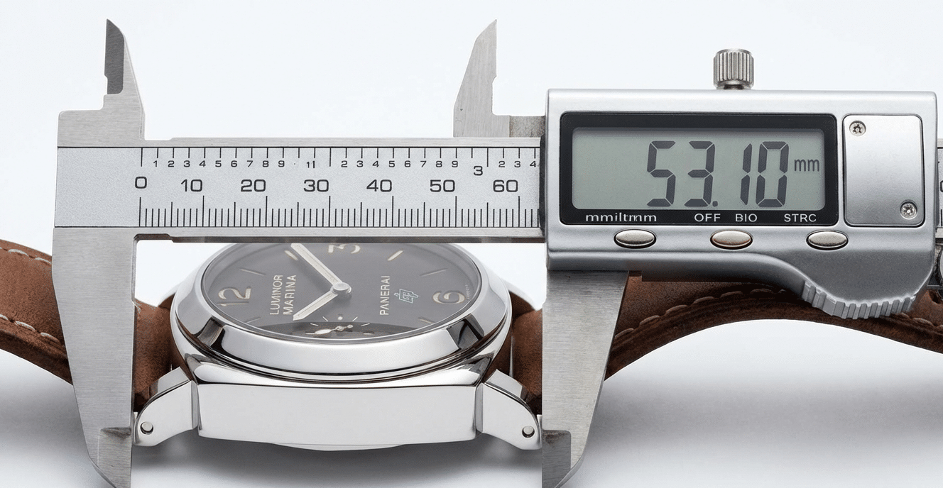 A close-up shot of a digital caliper measuring the lug-to-lug distance of a Panerai replica on a white background.