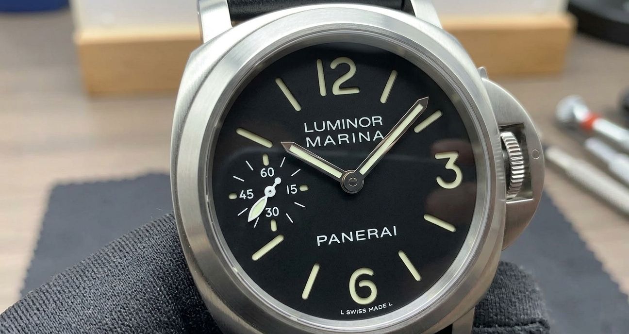 A close-up of a Panerai replica watch dial, highlighting potential areas for QC inspection like markers and hands.