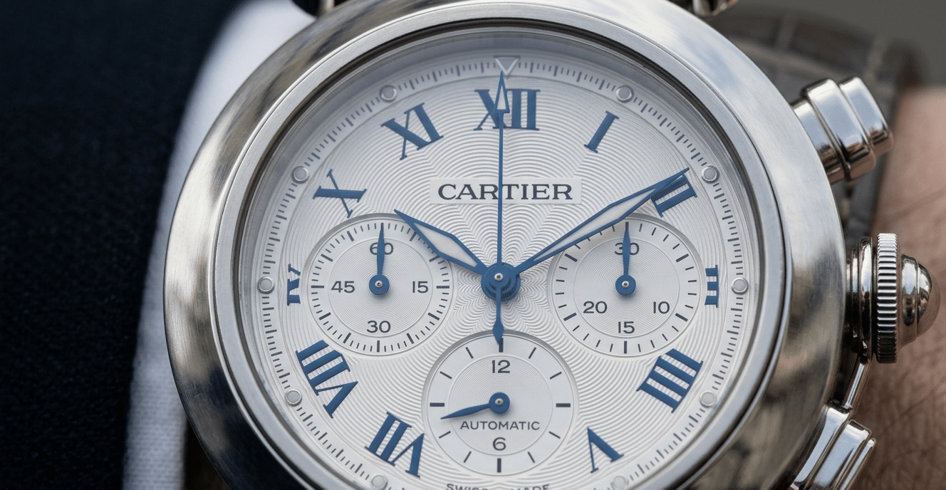 Close-up video still/GIF showing the smooth, instant reset of a chronograph seconds hand to zero, highlighting precision