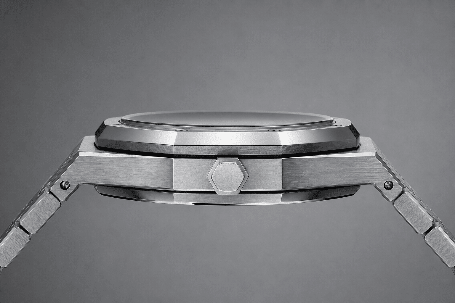 side profile QC view of an AP-style replica showing case thickness, bezel height, caseback shape, and integrated bracelet transition