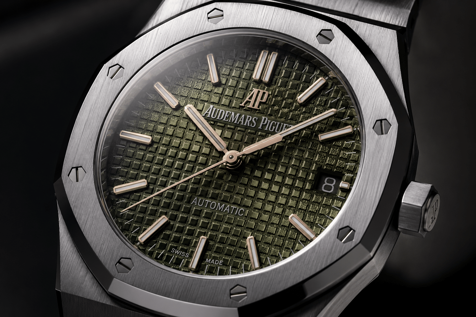 angled lighting view of AP Royal Oak replica tapisserie dial showing texture depth, shadow lines, and color shift