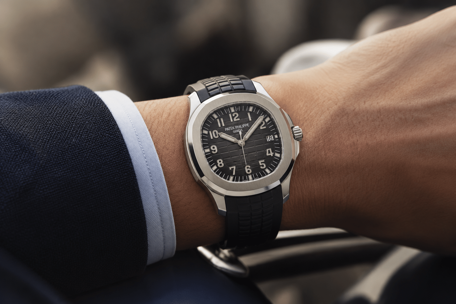 wrist shot showing Aquanaut strap integration, clasp closure, and how the watch sits flat on the wrist